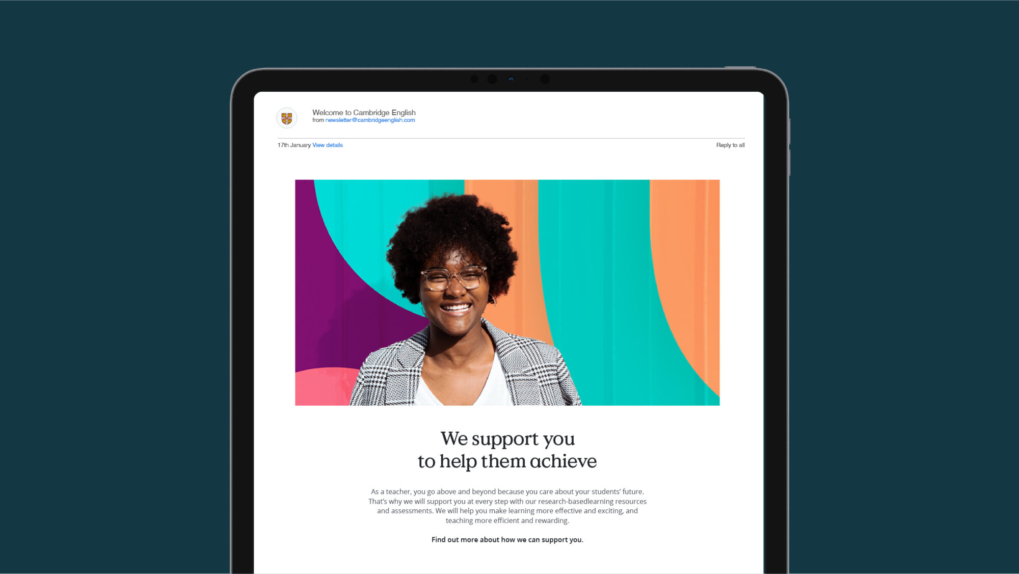 A tablet on a dark blue background that shows a Cambridge University newsletter.